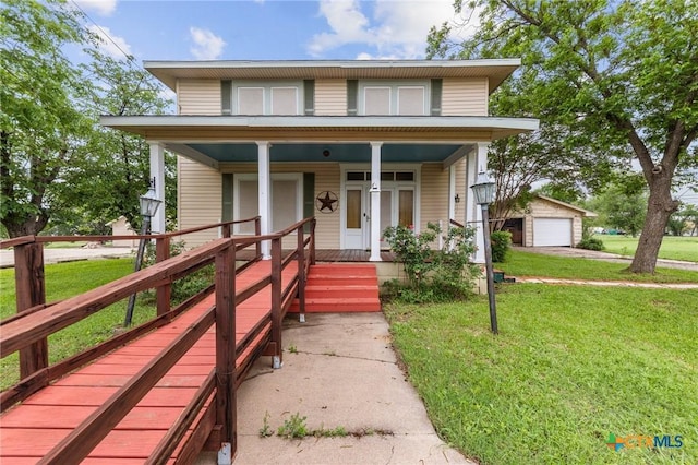 9 S Milam St, Rogers, TX 76569 - view of front facade with covered porch, a garage, and a front yard
