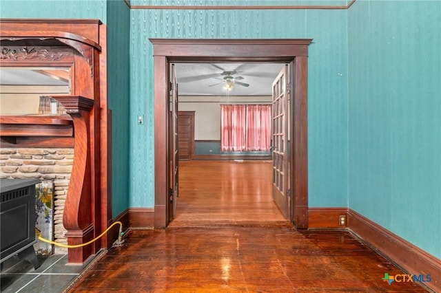 9 S Milam St, Rogers, TX 76569 - corridor featuring hardwood / wood-style flooring and baseboards