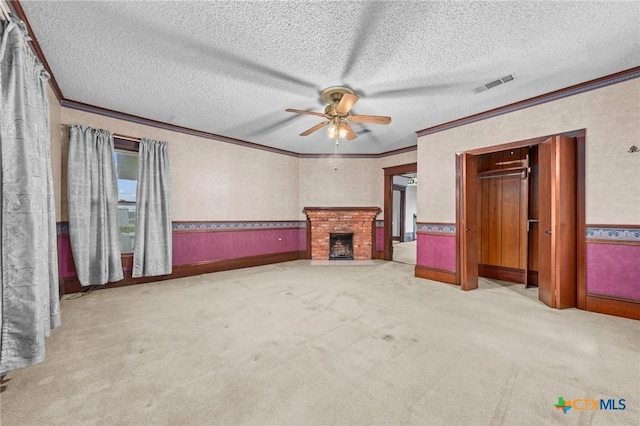 9 S Milam St, Rogers, TX 76569 - unfurnished living room with crown molding, visible vents, and ceiling fan
