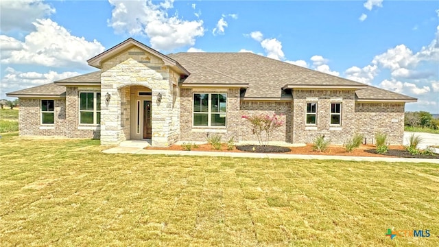 view of front facade with a front lawn