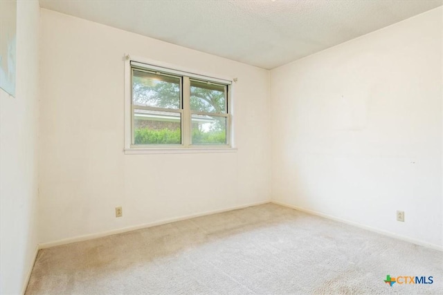 4412 Briar Cliff Rd, Temple, TX 76502 - carpeted empty room with baseboards