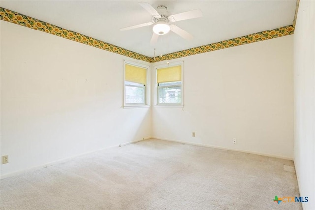 4412 Briar Cliff Rd, Temple, TX 76502 - spare room with carpet flooring, a ceiling fan, and baseboards