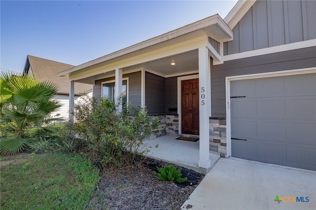 property entrance featuring a garage