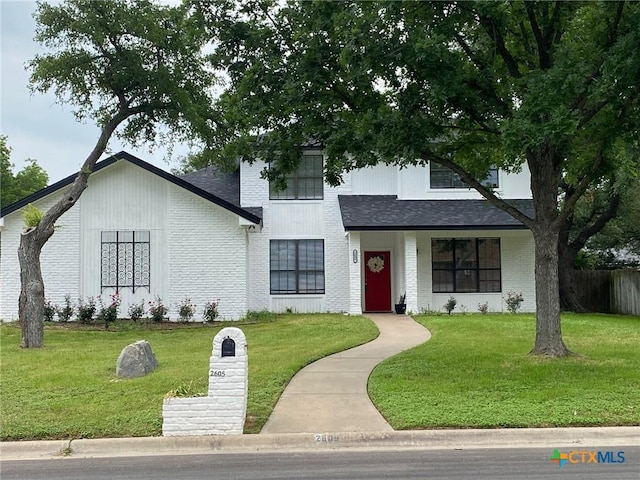 2605 Canyon Creek Dr, Temple, TX 76502 - modern farmhouse featuring brick siding and a shingled roof