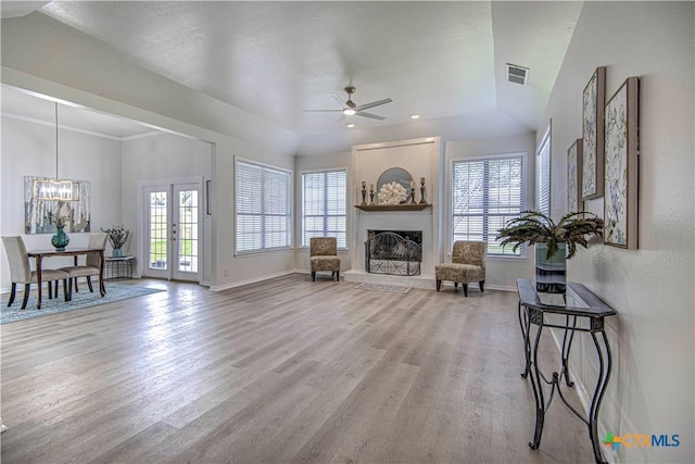 2605 Canyon Creek Dr, Temple, TX 76502 - living room featuring wood finished floors, baseboards, a chandelier, a ceiling fan, and recessed lighting