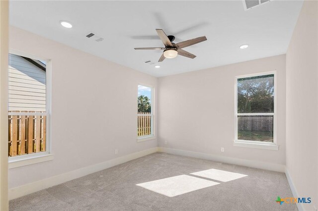 505 E Convent St, Victoria, TX 77901 - carpeted empty room featuring a ceiling fan, baseboards, and recessed lighting