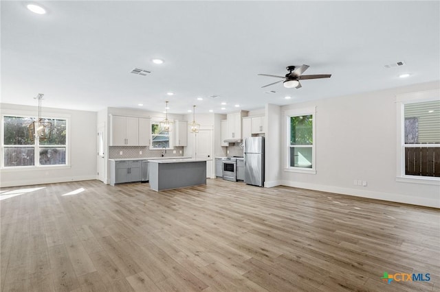 505 E Convent St, Victoria, TX 77901 - kitchen with open floor plan, appliances with stainless steel finishes, healthy amount of natural light, and recessed lighting