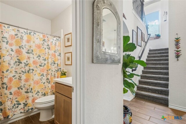 1640 Buckner Pl, San Antonio, TX 78253 - bathroom featuring vanity, toilet, and curtained shower