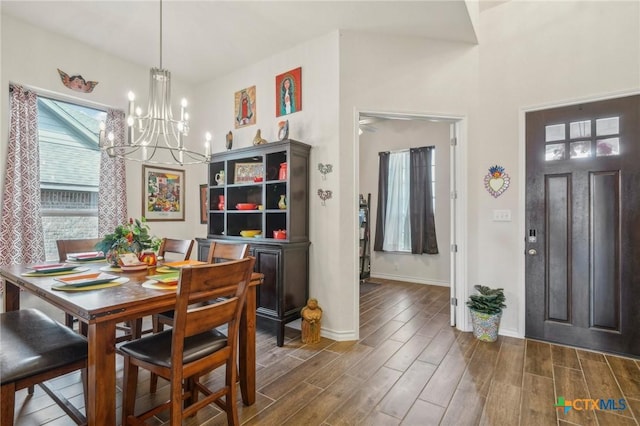 1640 Buckner Pl, San Antonio, TX 78253 - dining room with dark wood-type flooring and a notable chandelier