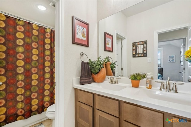 1640 Buckner Pl, San Antonio, TX 78253 - full bathroom with shower / bathtub combination with curtain, vanity, and toilet