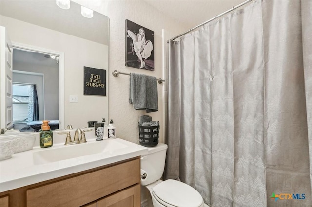 1640 Buckner Pl, San Antonio, TX 78253 - bathroom with vanity, toilet, and a shower with shower curtain