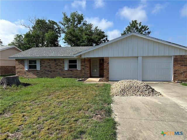 908 Randa St, Copperas Cove, TX 76522 - single story home featuring driveway, brick siding, a front lawn, an attached garage, and a shingled roof