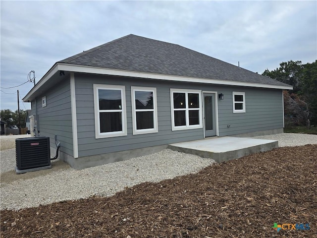 back of house with a patio area and central air condition unit