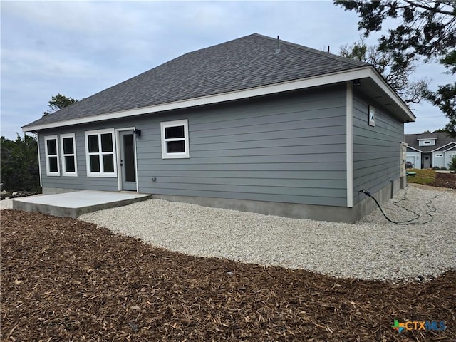 back of house with a patio area