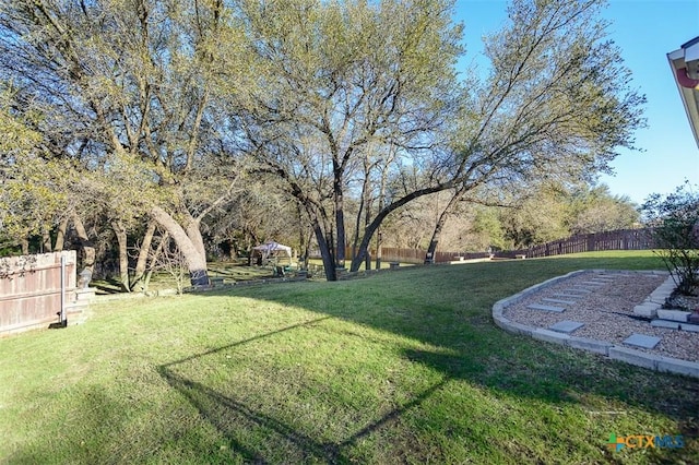 view of yard featuring fence