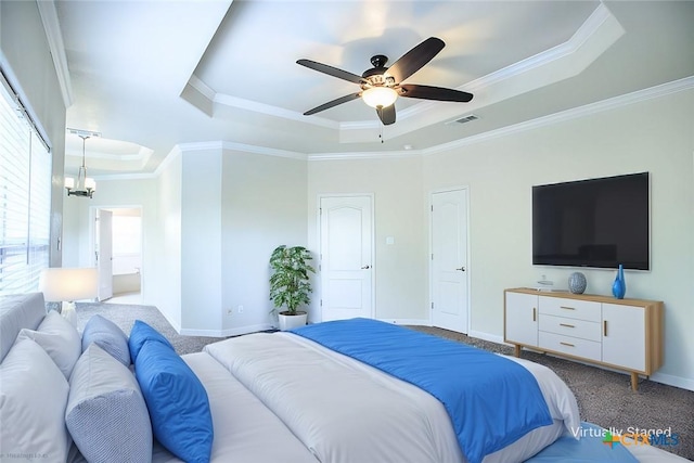 carpeted bedroom featuring a raised ceiling, visible vents, crown molding, and baseboards