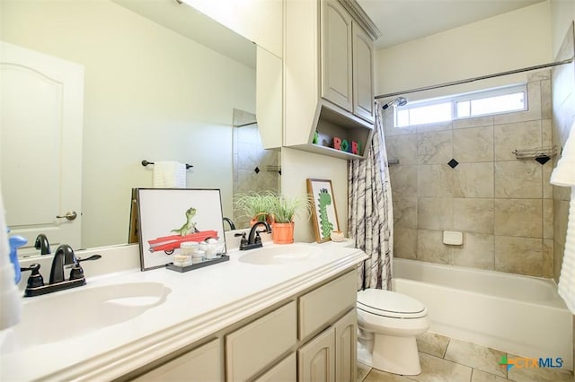 full bathroom with a sink, double vanity, tile patterned flooring, and shower / bath combo with shower curtain