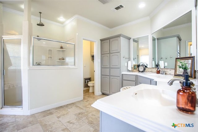 bathroom with toilet, visible vents, ornamental molding, a closet, and a shower stall