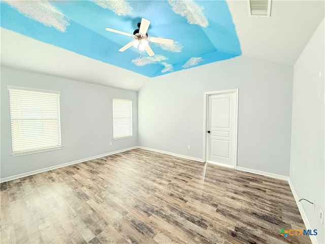 3434 Horizon St, Copperas Cove, TX 76522 - empty room featuring a ceiling fan, visible vents, vaulted ceiling, wood finished floors, and baseboards
