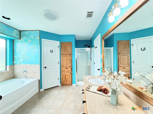 3434 Horizon St, Copperas Cove, TX 76522 - full bath with a garden tub, visible vents, a stall shower, vanity, and tile patterned floors