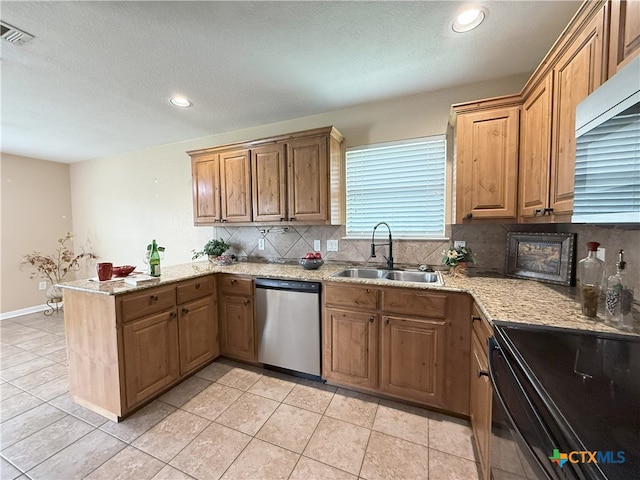3434 Horizon St, Copperas Cove, TX 76522 - kitchen featuring decorative backsplash, a sink, a peninsula, and black appliances