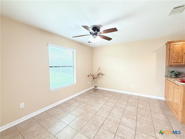 3434 Horizon St, Copperas Cove, TX 76522 - spare room featuring a ceiling fan, baseboards, visible vents, and light tile patterned flooring