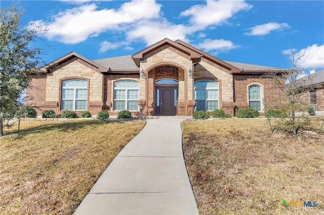 view of front of property with a front lawn