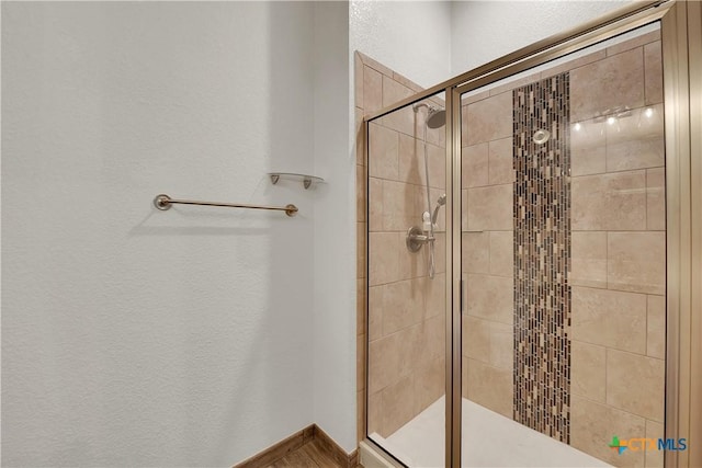 bathroom featuring walk in shower