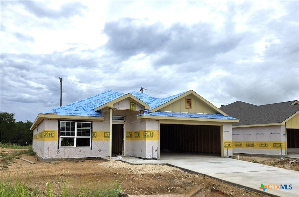 1413 Fossil Trl, Belton, TX 76513 - property in mid-construction with concrete driveway and a garage