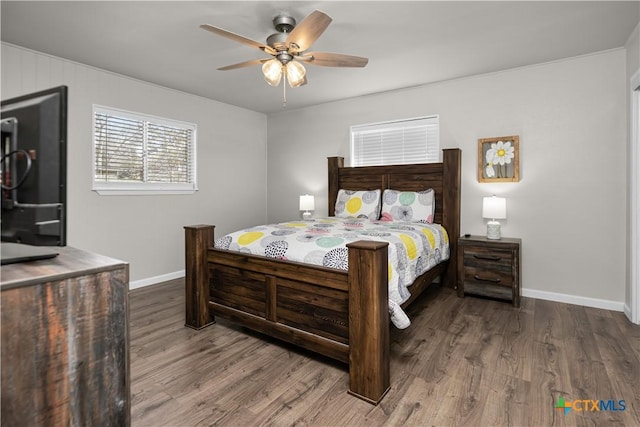 bedroom featuring ceiling fan and hardwood / wood-style floors