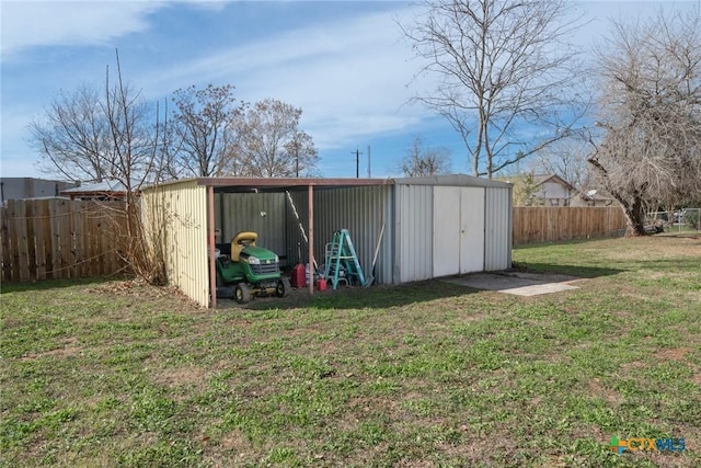 view of outbuilding with a yard