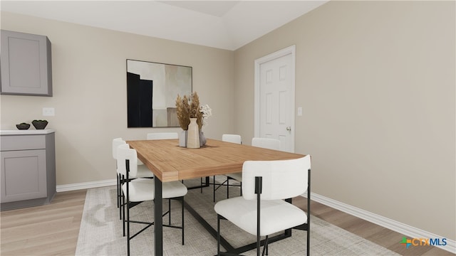 dining area with light hardwood / wood-style flooring