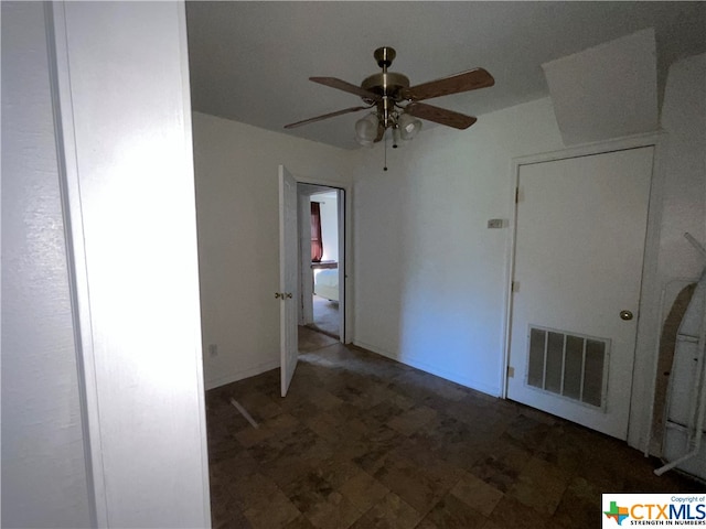 unfurnished room featuring ceiling fan