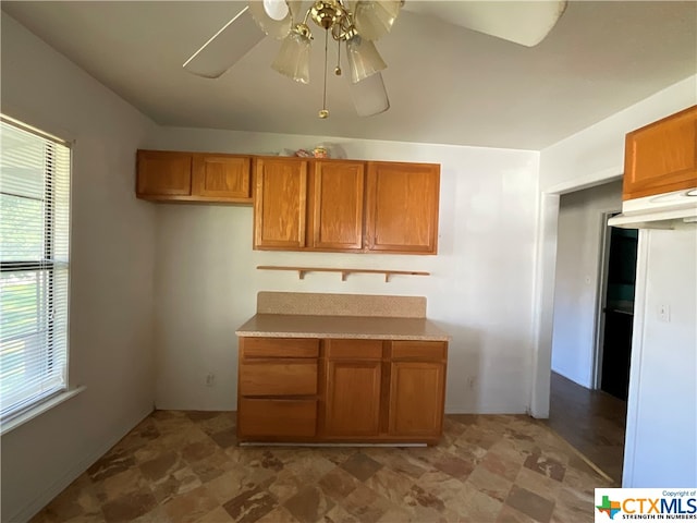 kitchen featuring ceiling fan