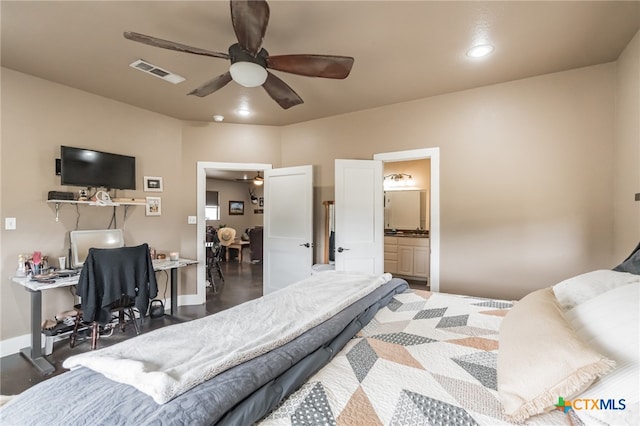 bedroom with ceiling fan and connected bathroom