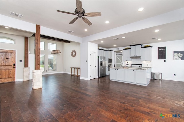 3814 Twilight Dr, Temple, TX 76502 - unfurnished living room with a ceiling fan, dark wood-type flooring, and recessed lighting