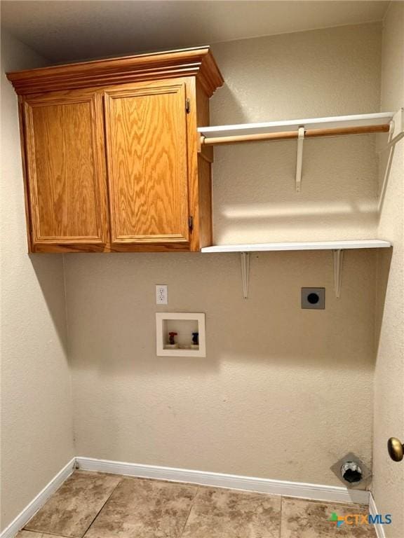 3508 Lucas St, Copperas Cove, TX 76522 - clothes washing area with electric dryer hookup, hookup for a washing machine, baseboards, and cabinet space