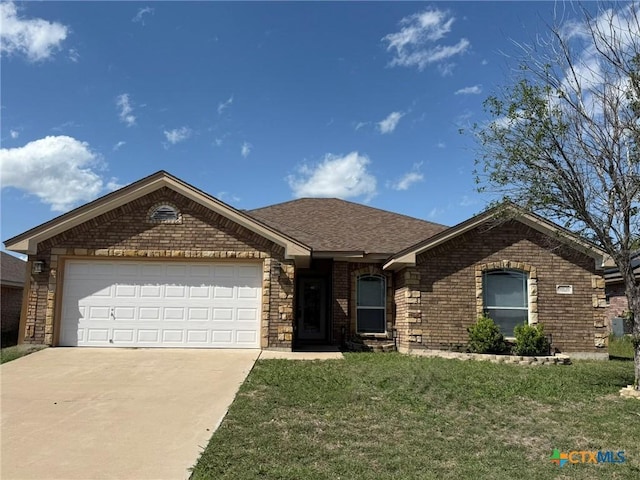 3508 Lucas St, Copperas Cove, TX 76522 - single story home with a front yard, driveway, an attached garage, and brick siding