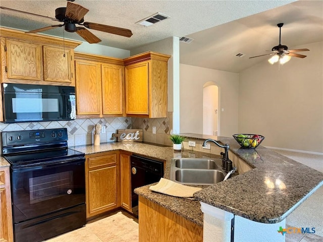 3508 Lucas St, Copperas Cove, TX 76522 - kitchen featuring black appliances, a ceiling fan, a sink, a peninsula, and backsplash