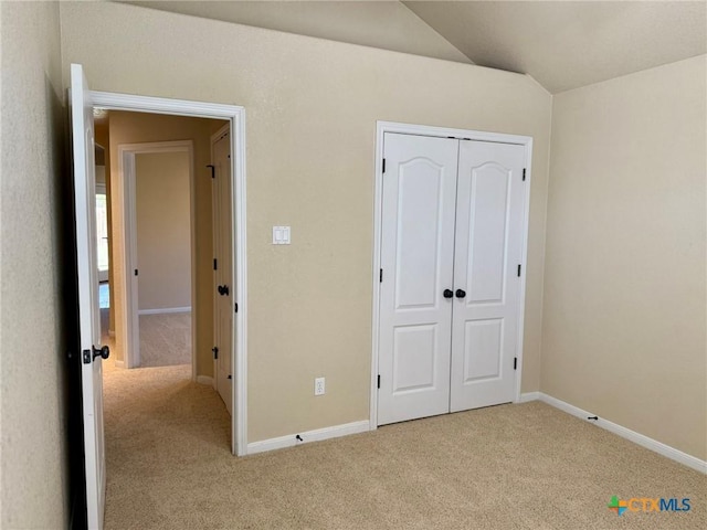 3508 Lucas St, Copperas Cove, TX 76522 - unfurnished bedroom with light colored carpet, vaulted ceiling, a closet, and baseboards