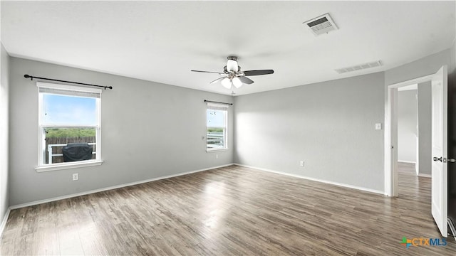 912 Bexley Dr, Seguin, TX 78155 - unfurnished room featuring wood finished floors and a ceiling fan
