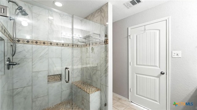912 Bexley Dr, Seguin, TX 78155 - bathroom featuring a shower stall and tile patterned floors
