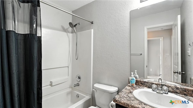 912 Bexley Dr, Seguin, TX 78155 - full bath featuring vanity, a textured wall, and shower / bath combo with shower curtain