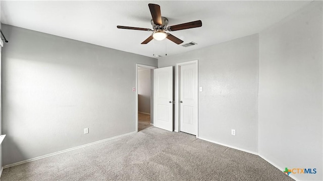 912 Bexley Dr, Seguin, TX 78155 - unfurnished bedroom with carpet floors and a ceiling fan