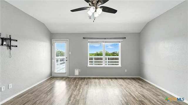912 Bexley Dr, Seguin, TX 78155 - unfurnished room featuring wood finished floors, ceiling fan, and lofted ceiling