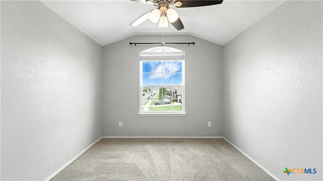 912 Bexley Dr, Seguin, TX 78155 - unfurnished room with a ceiling fan, carpet, vaulted ceiling, and a textured wall