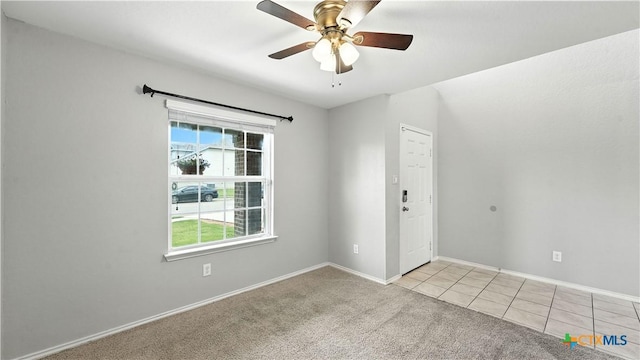 912 Bexley Dr, Seguin, TX 78155 - unfurnished room featuring plenty of natural light, light colored carpet, a ceiling fan, and light tile patterned floors