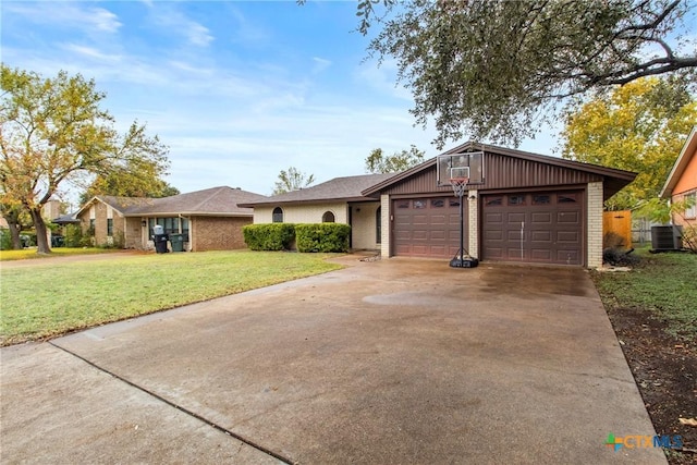 ranch-style home featuring central air condition unit and a front yard