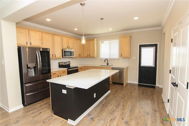 kitchen with light brown cabinets, a center island, stainless steel appliances, and sink