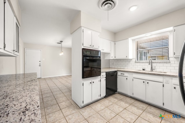 kitchen featuring hanging light fixtures, white cabinetry, sink, and black appliances